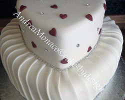 Anniversary cake with red love hearts