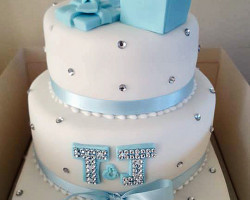 white-engagement-cake-with-blue-iced-decoration-and-crystals by wedding cakes in middlesbrough